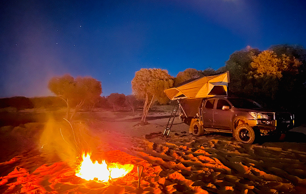 4wd and camper on beach