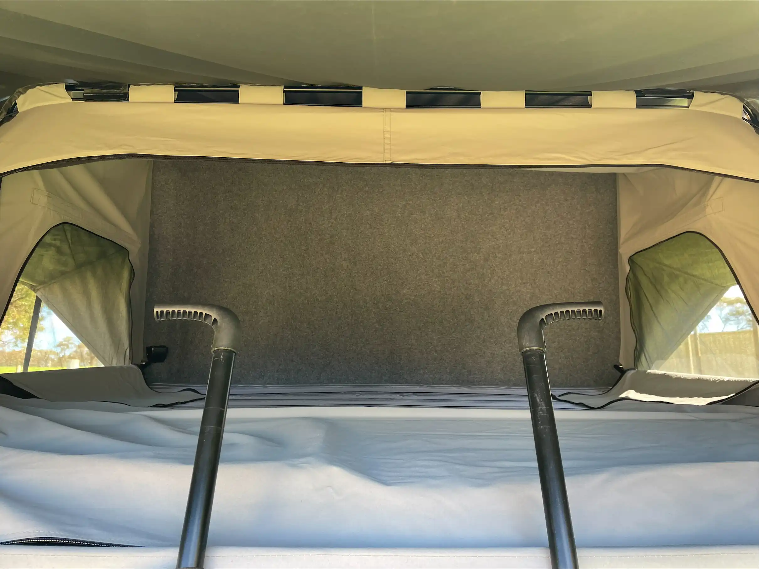 image of desert king camper with window extended